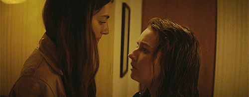 Two young girls first kiss in scene from the movie Booksmart showing losing virginity from lesbian sex.