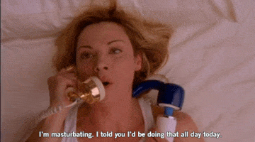 Samantha from Sex and the City holding a sex toy and answering the phone mid-masturbation, saying "I'm masturbating. I told you i'd be doing that all day today."